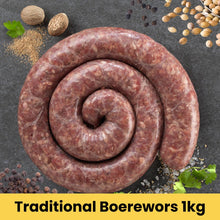 Load image into Gallery viewer, Traditional Boerewors sausage with spices on a dark background